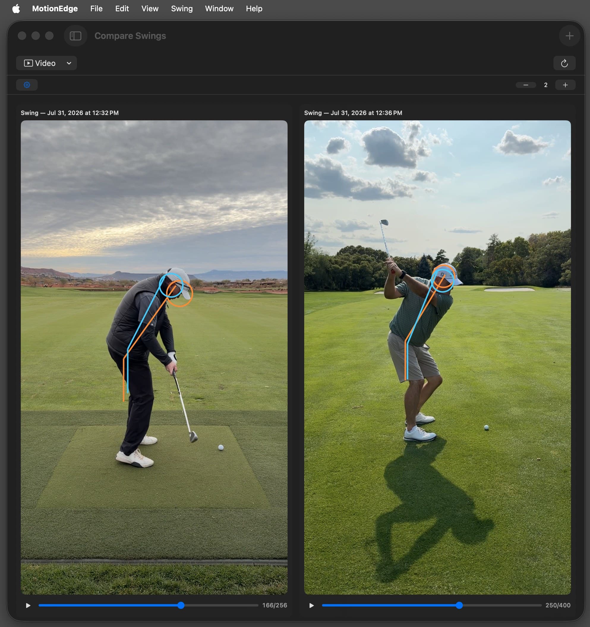 MotionEdge Compare Swings on Mac with the macOS menu bar above it. A panel-count stepper in the toolbar reads 2, and two swing videos sit side by side, each with its own play button and frame scrubber. The left panel shows a golfer at address on a range mat at dusk; the right shows a different golfer at the top of the backswing on a fairway. Both have the blue and orange pose overlay drawn on head and spine