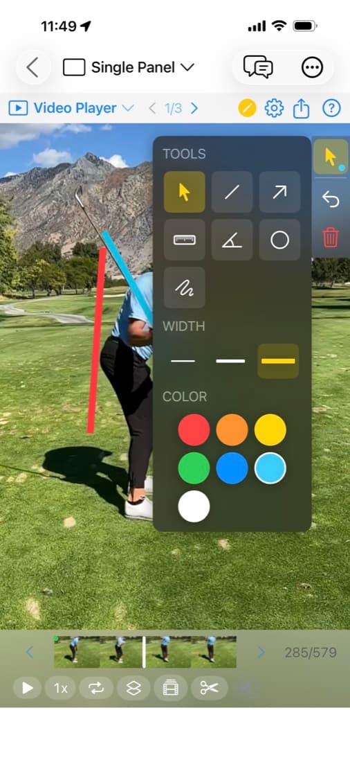 The MotionEdge drawing palette open over a swing on iPhone, showing tools for select, line, arrow, ruler, angle, circle and freehand, three stroke widths, and seven colours — with a red vertical line and a blue shaft line already drawn on the golfer
