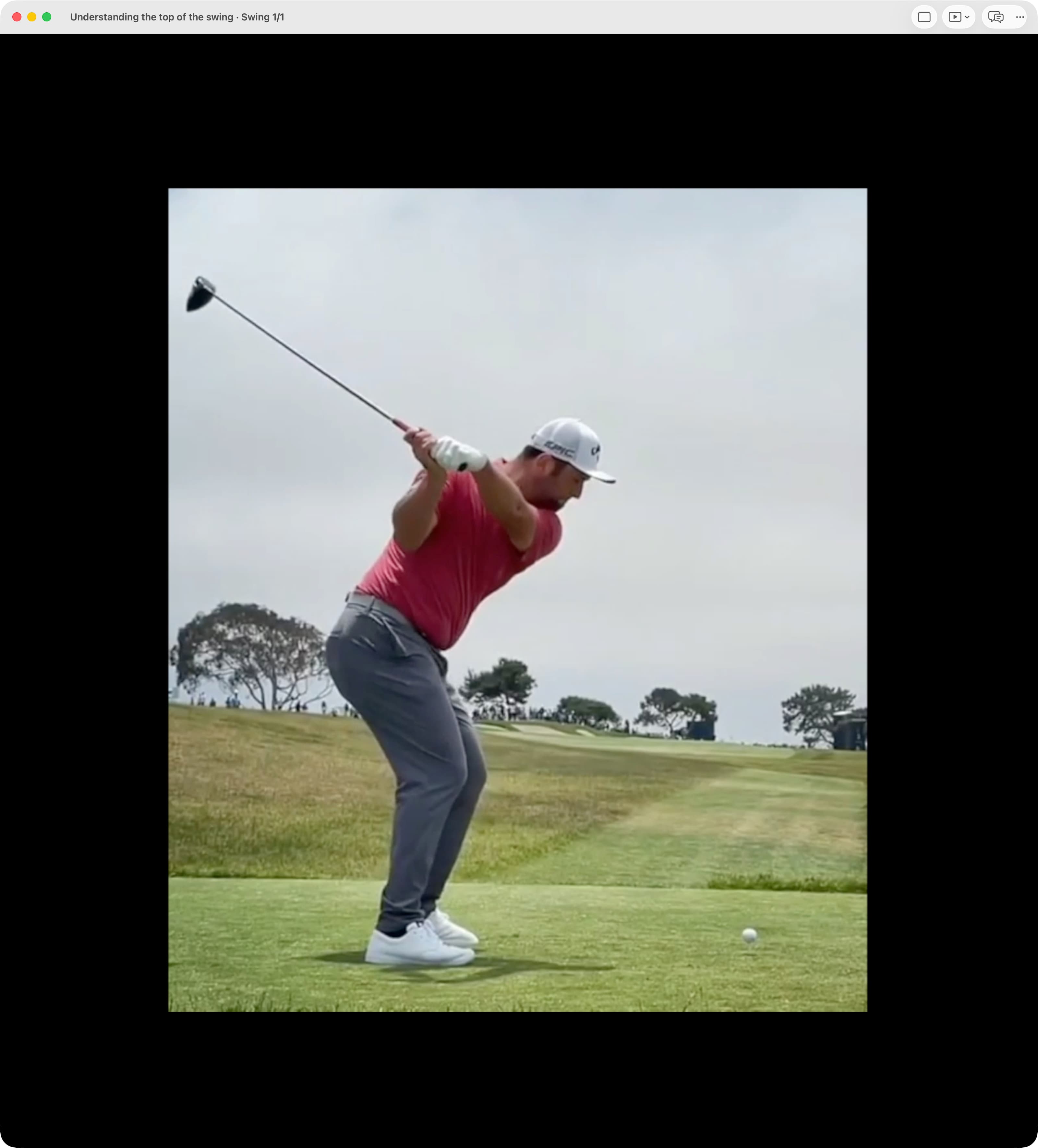 Jon Rahm in Transition in MotionEdge, with the hands beginning to lower from the compact top and the shaft moving with them.