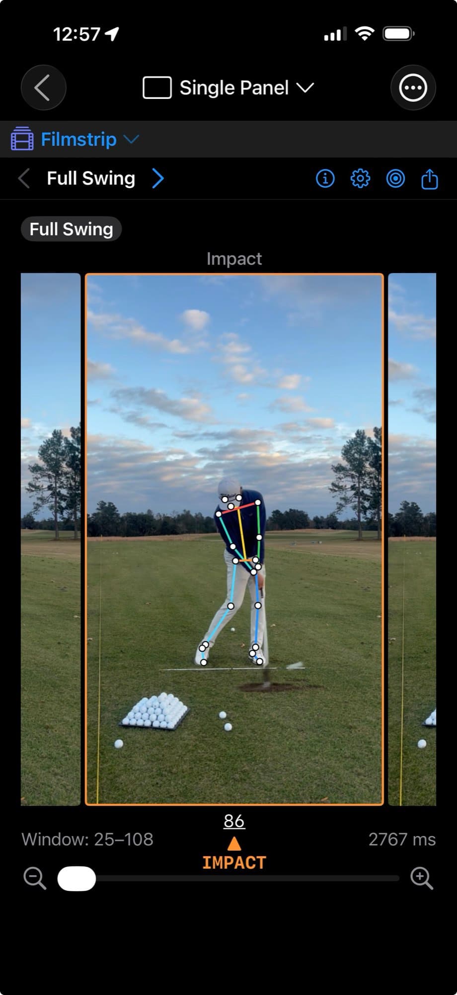 A swing on iPhone paused at the graded Impact position, cyan posture tracking drawn over the golfer, with the filmstrip scrubber below marking frame 86 of the detected swing window as IMPACT