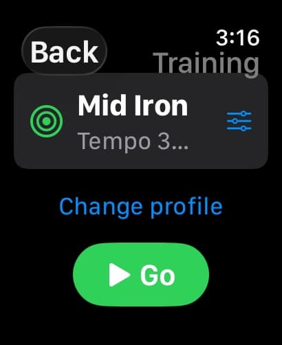 The MotionEdge Apple Watch training screen showing the active profile "Mid Iron" with a tempo goal, a Change profile link, and a large green Go button