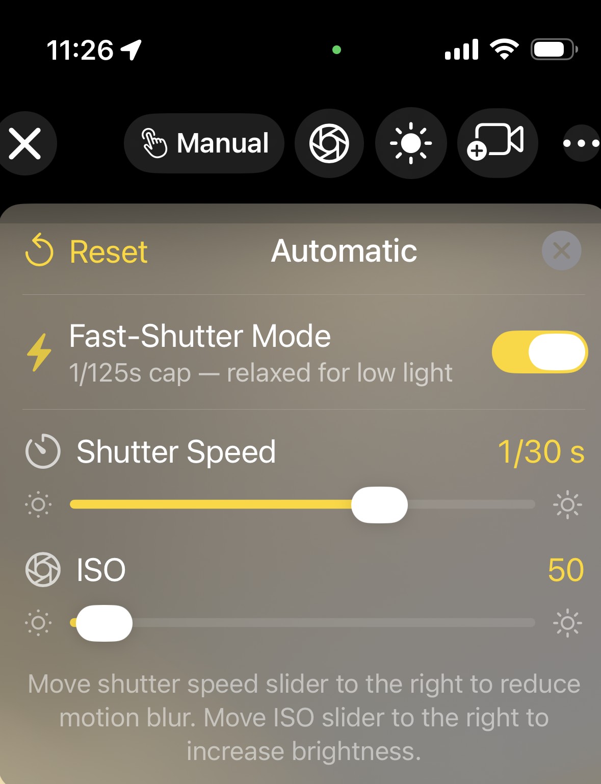 The MotionEdge exposure card — a Fast-Shutter Mode toggle at the top with its current cap caption, a Shutter Speed slider, and an ISO slider, with Reset and the Automatic/Manual label across the top